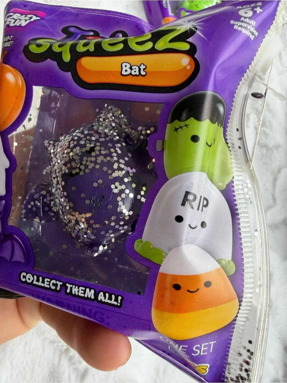 💜🦇 **TABA SQUEEZE THE BAT – PURPLE GLITTER MINI HALLOWEEN SQUISHY!** ✨🎃